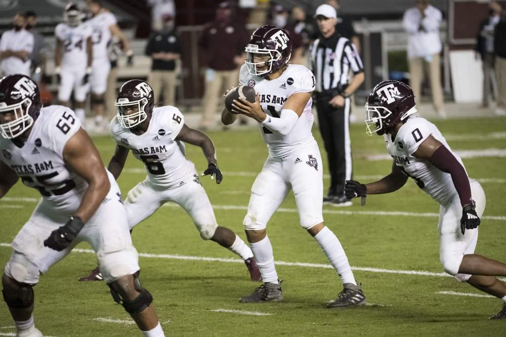 No. 5 Texas A&M pauses after 2 positive virus tests