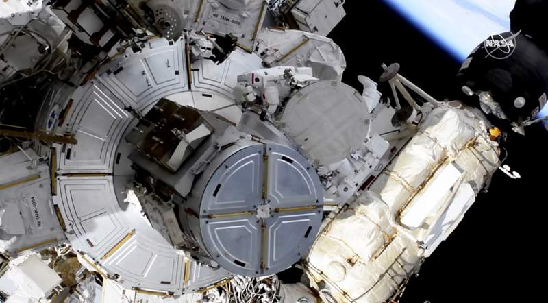 Spacewalking astronauts boosting station’s solar power