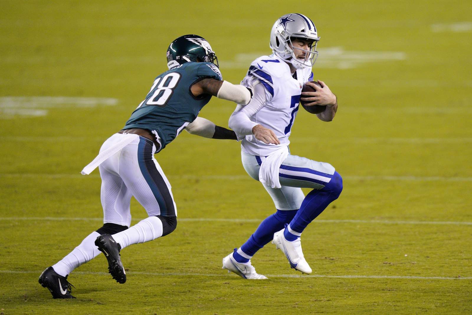 Cowboys try many tricks with rookie QB, fall to Eagles 23-9