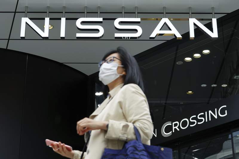 Japan's Nissan sees smaller loss, promises sales recovery
