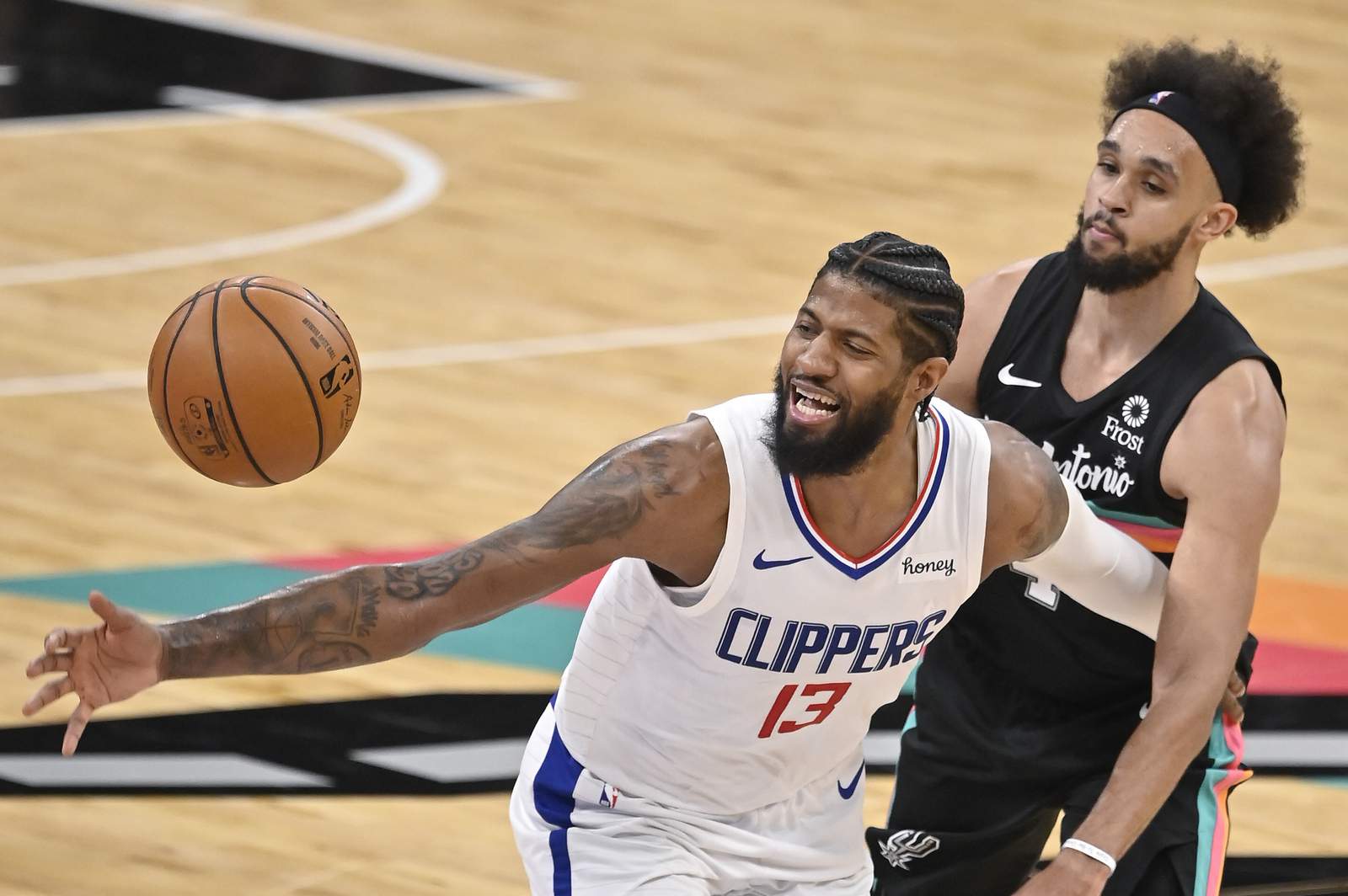Jackson, George lead short-handed Clippers past Spurs, 98-85