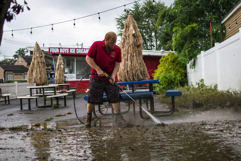 Cleanup begins in soggy Northeast as Henri plods back to sea