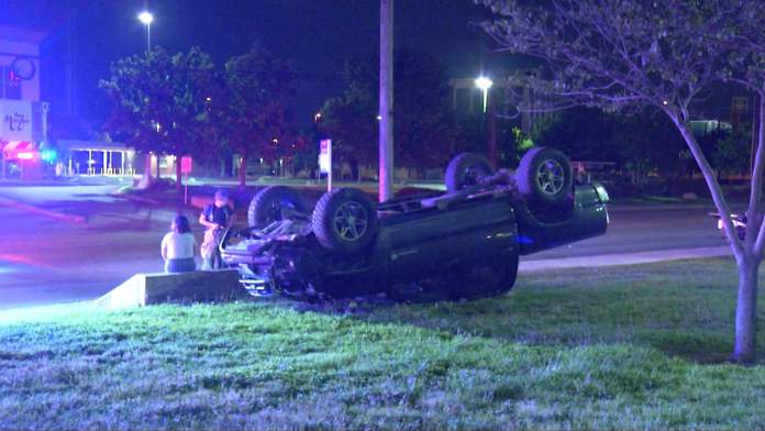 Woman detained on suspicion of DWI after rollover crash on North Side, police say