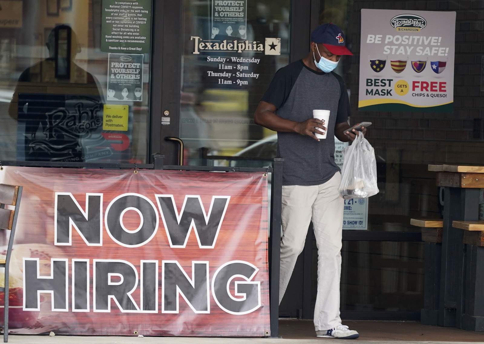 Jobless claims fall to 881,000 but layoffs remain elevated
