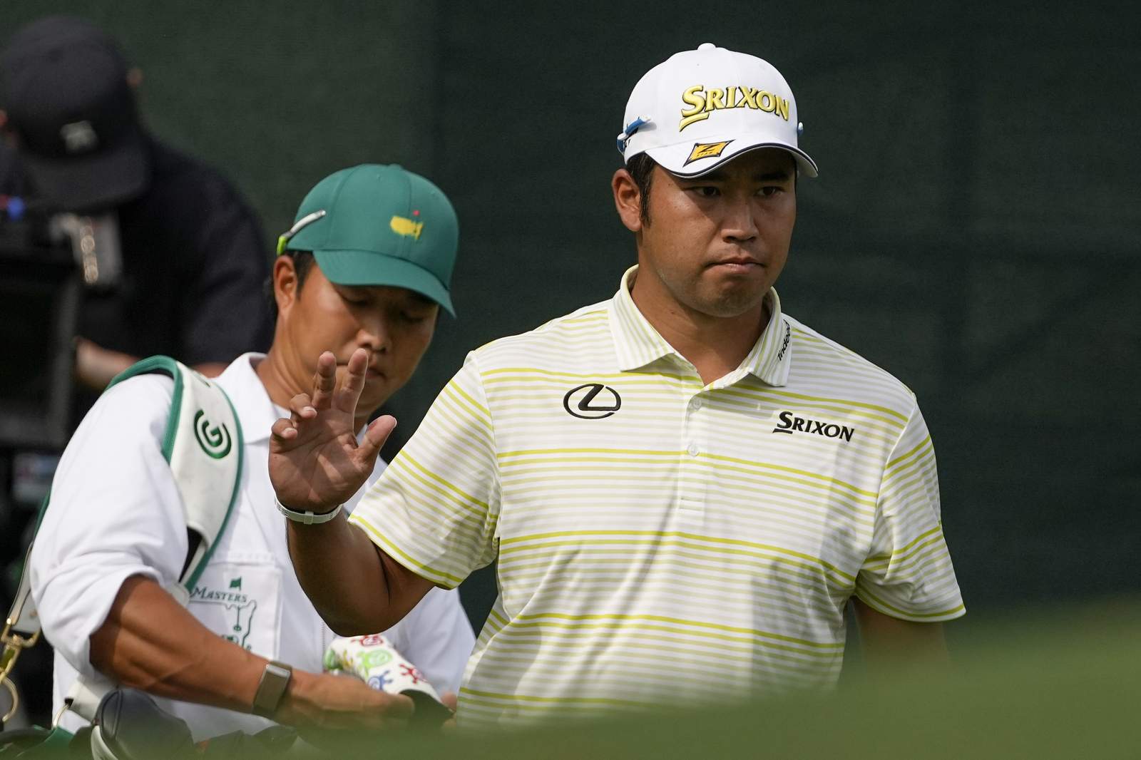 The Latest: Matsuyama 1st man from Japan to win golf major