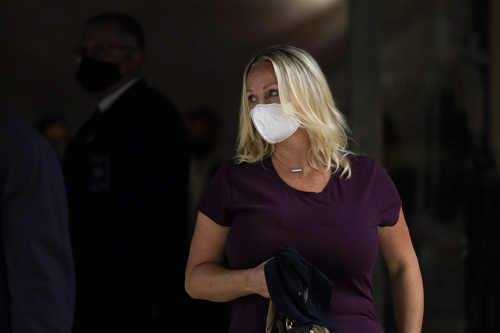 Wife of ex-California congressman sentenced for corruption