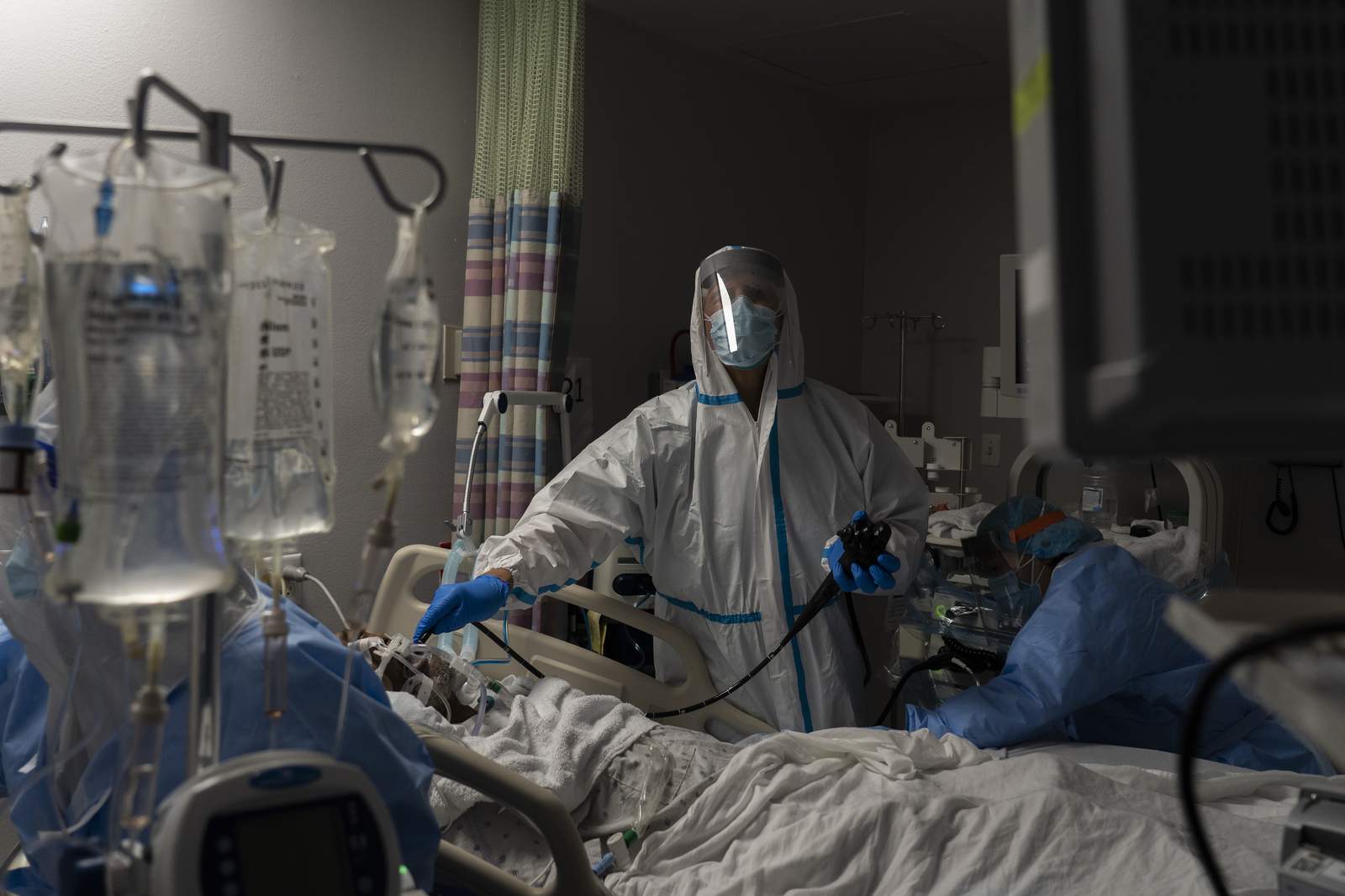 Texas on brink of record 13K in hospitals as virus surges