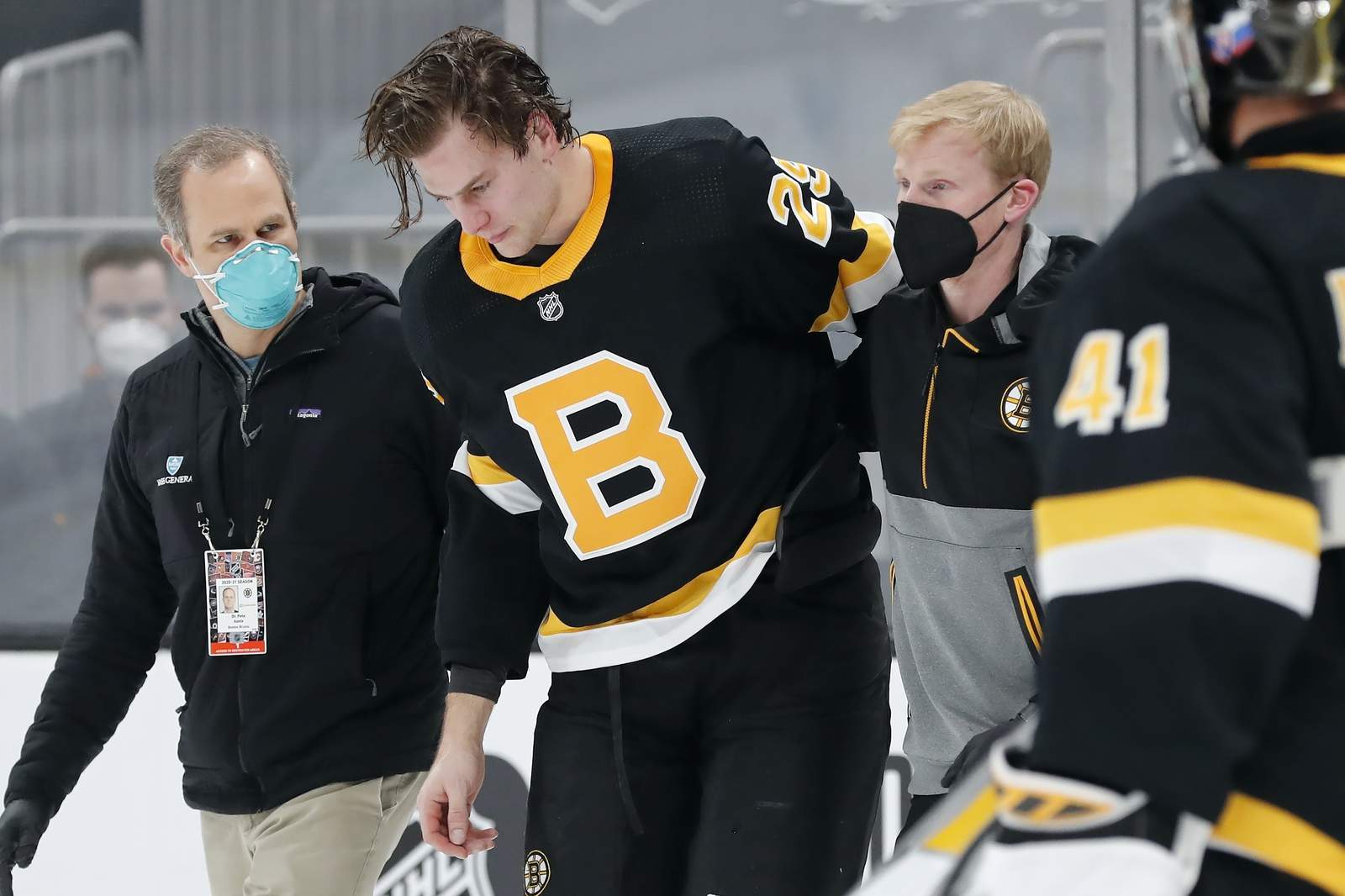 Bruins coach: Carlo 'feeling better,' week-to-week after hit
