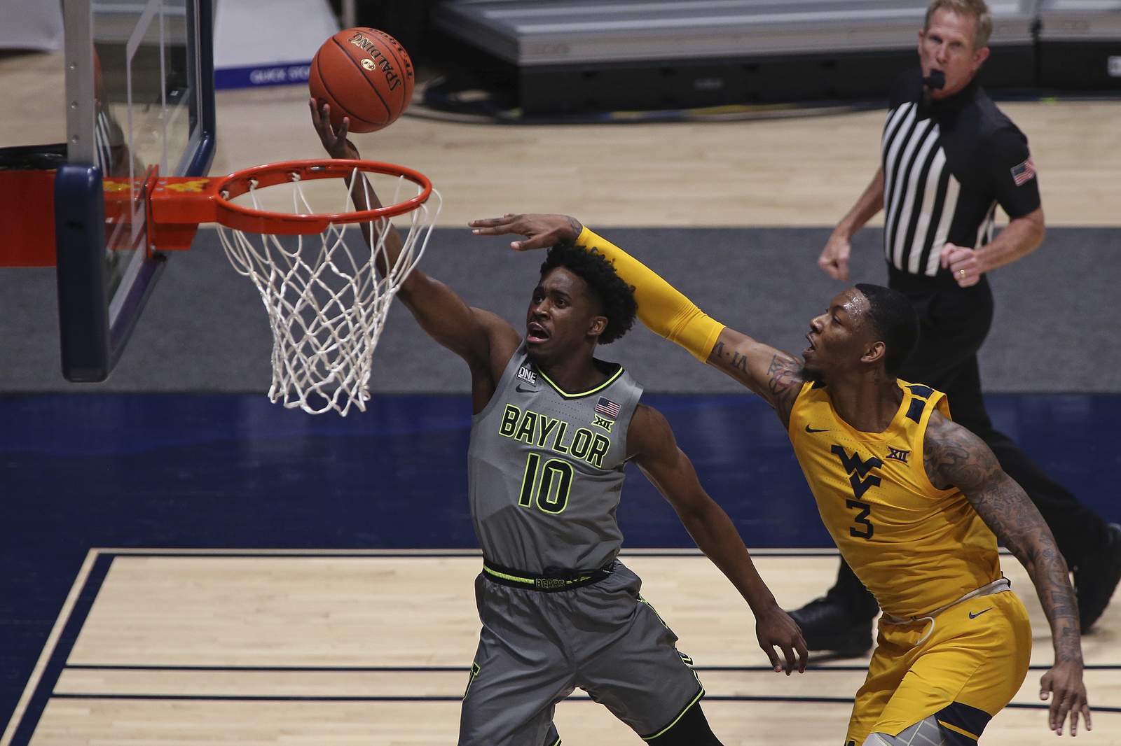 No. 3 Baylor clinches B12 title in OT, 94-89 over No. 6 WVU