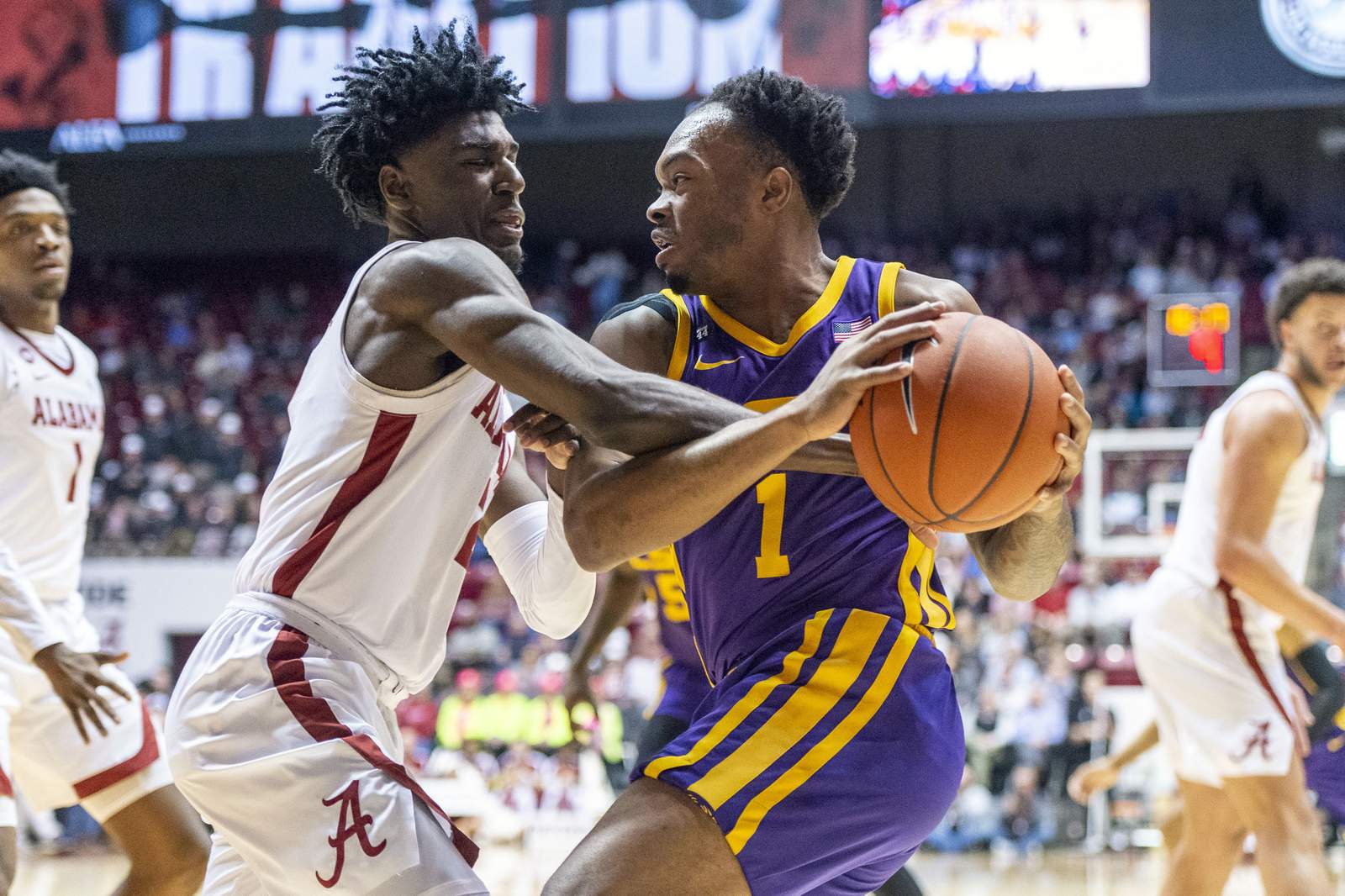 Smart leads LSU past Sam Houston State without coach Wade