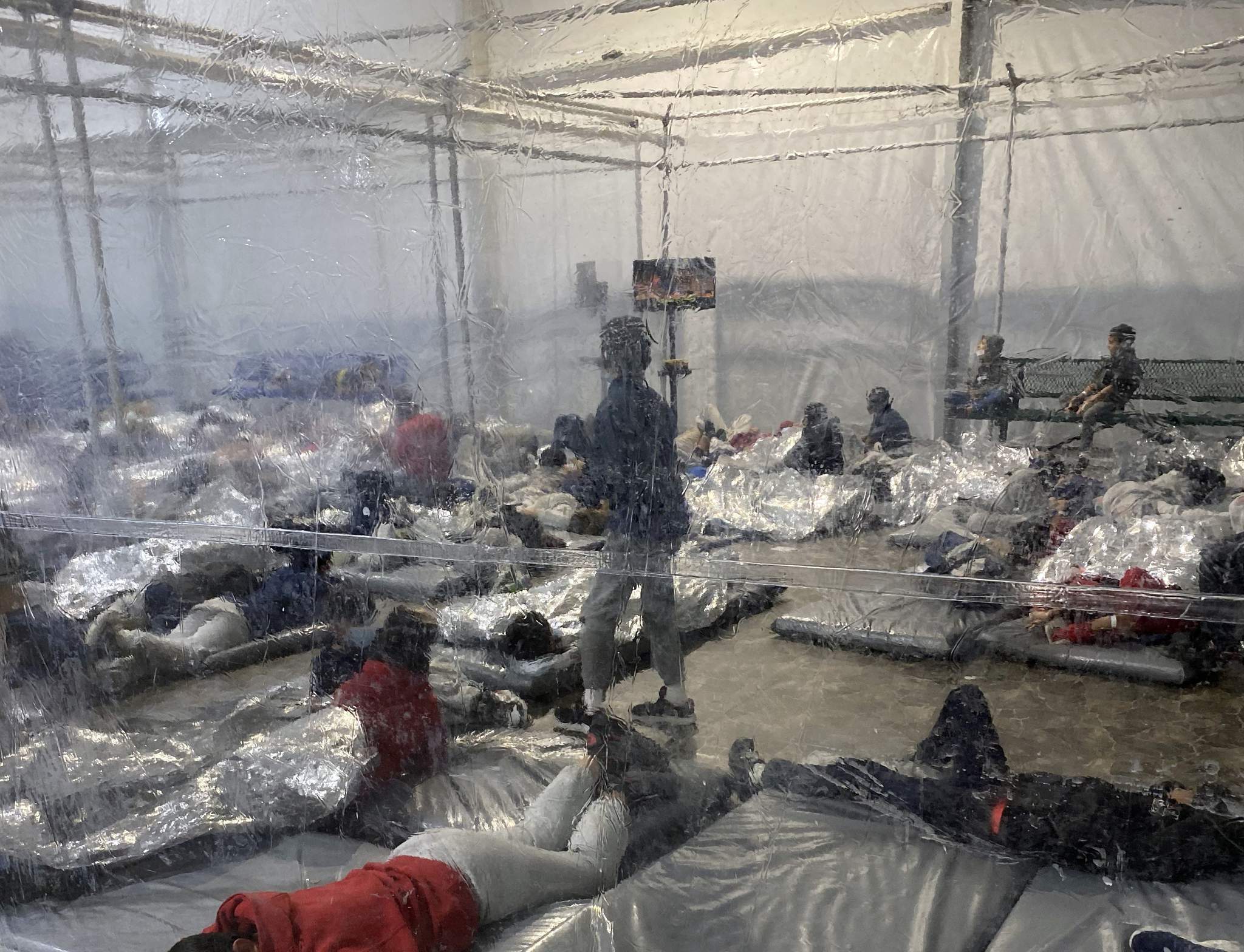 Photos of migrant detention highlight Biden's border secrecy