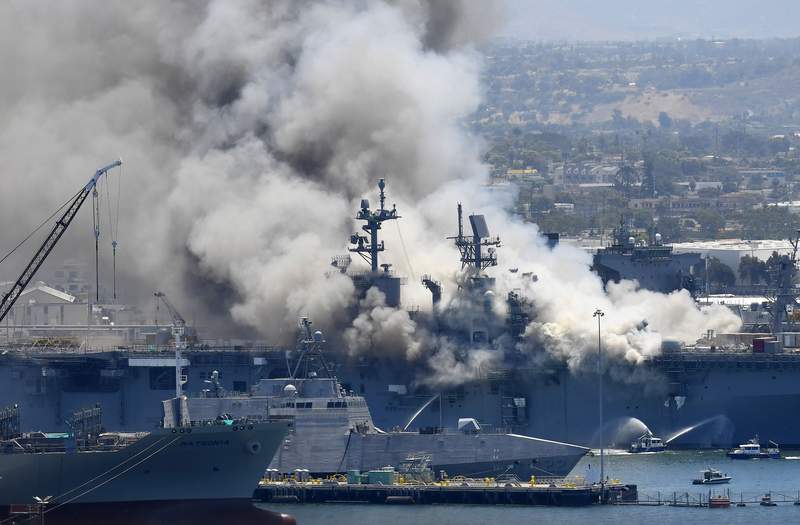 Navy charges sailor with setting fire that destroyed warship