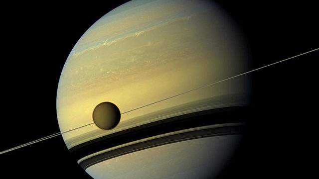 Saturns moon Titan is rapidly migrating away from the planet