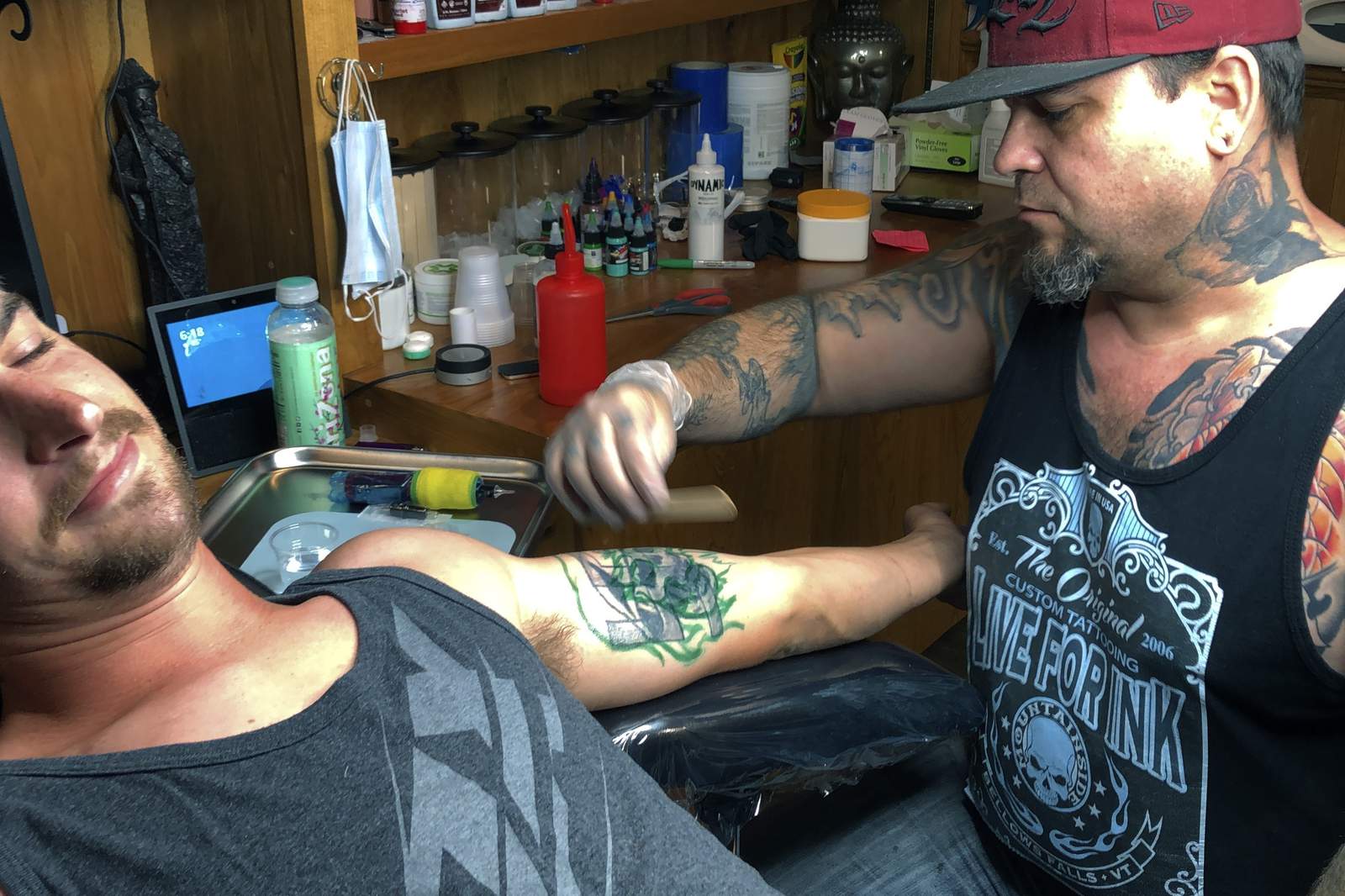 Tattoo artist sees bump in desire to erase hateful skin art