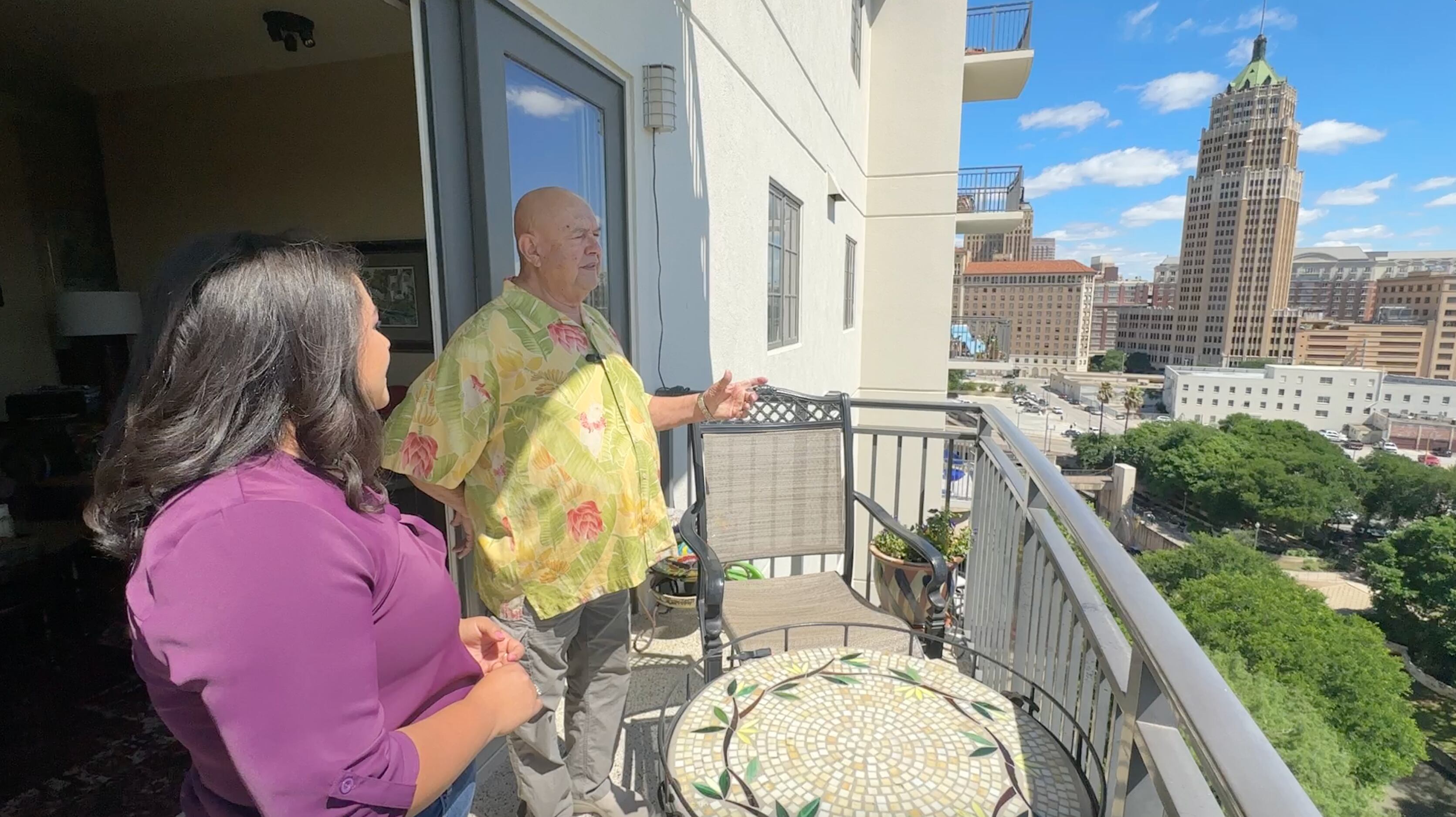 Tony Cantu stands on the balcony of his condo in downtown San Antonio.