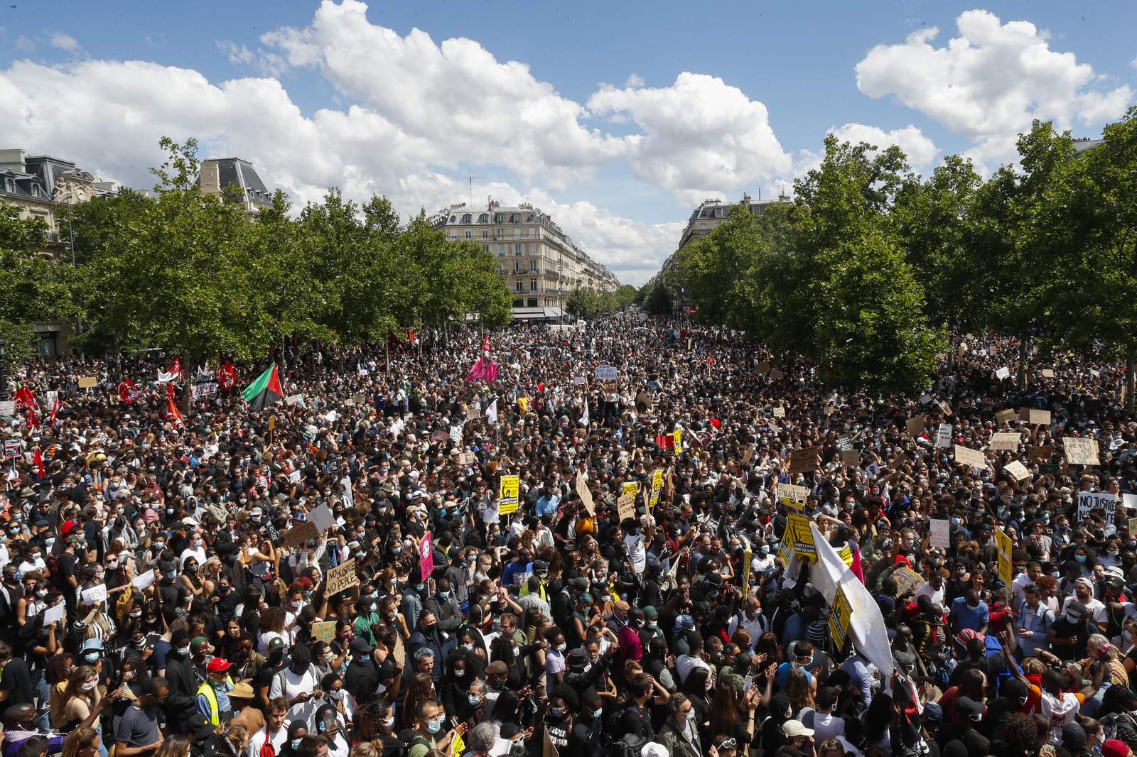 Paris marchers decry racism, far right rallies in London