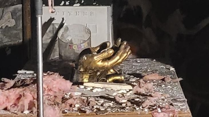 A golden ornament was one of few items in the sanctuary that survived the fire.