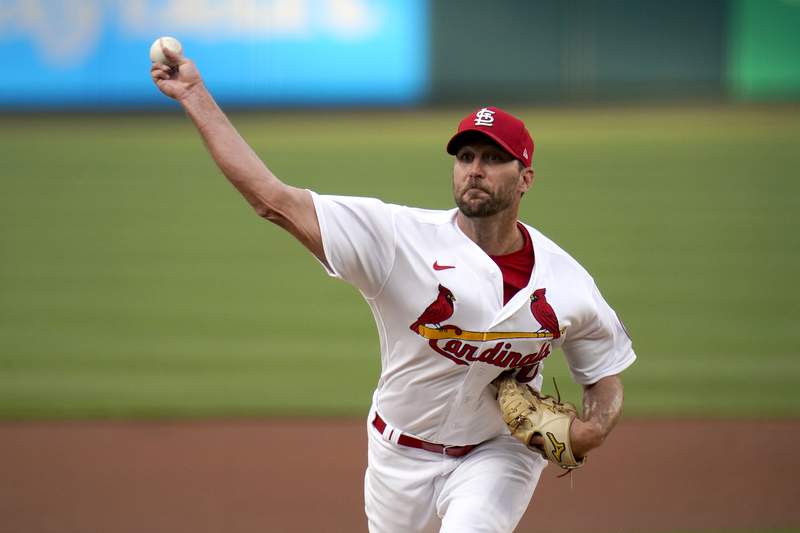 Wainwright, Cards win 5th in row; Mets fire hitting coaches