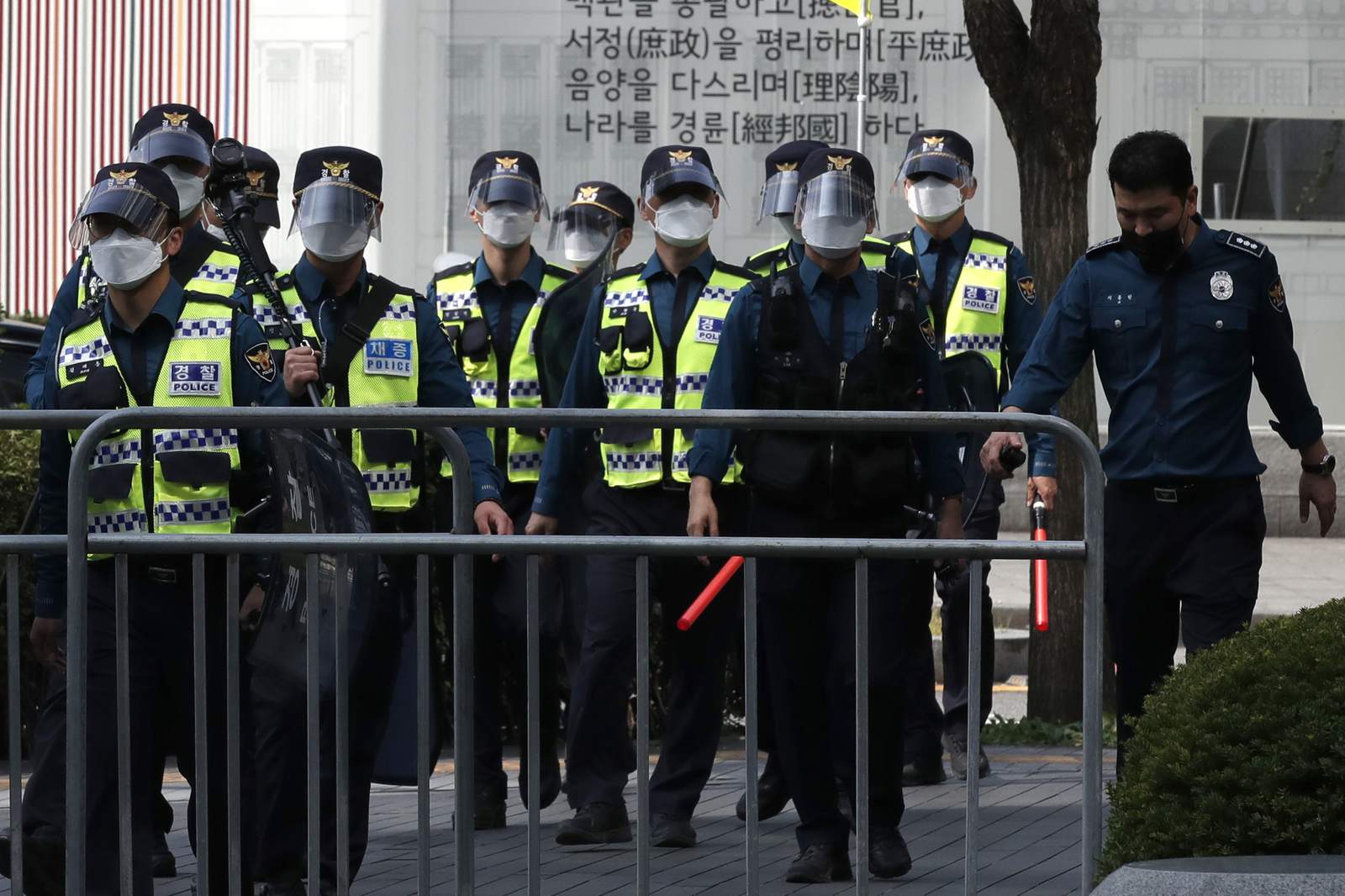 The Latest: S. Korea reports virus numbers trending lower