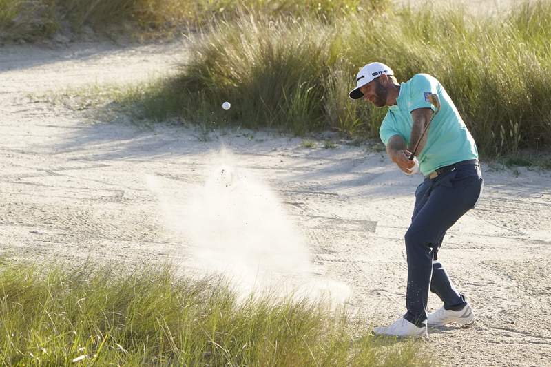 The Latest: Dustin Johnson opens with 76 at PGA Championship