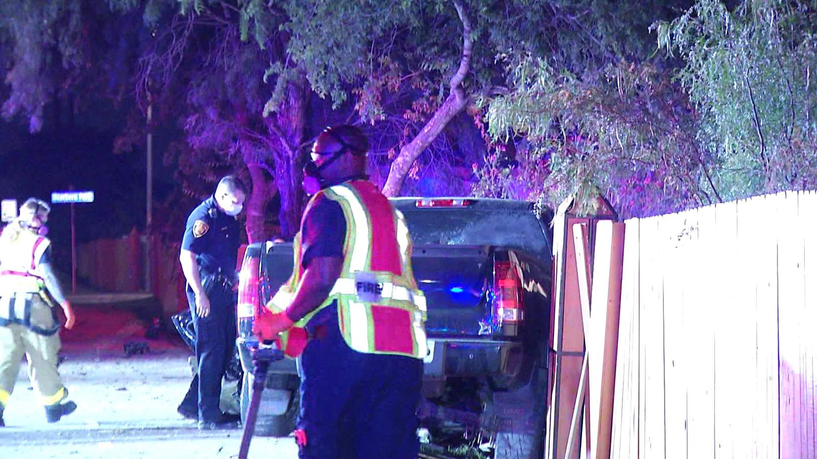 Driver crashes pickup truck into fence, backyard of SW Side home, police say