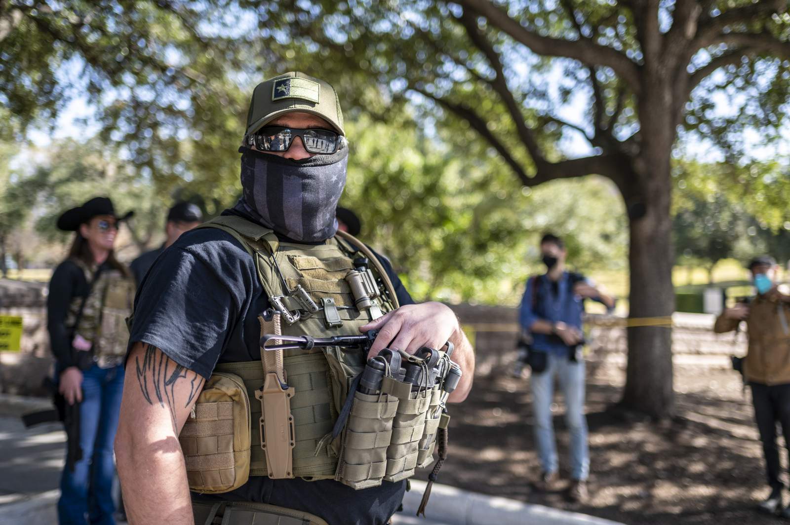 Images show small group of armed protesters gathering in Austin before presidential inauguration