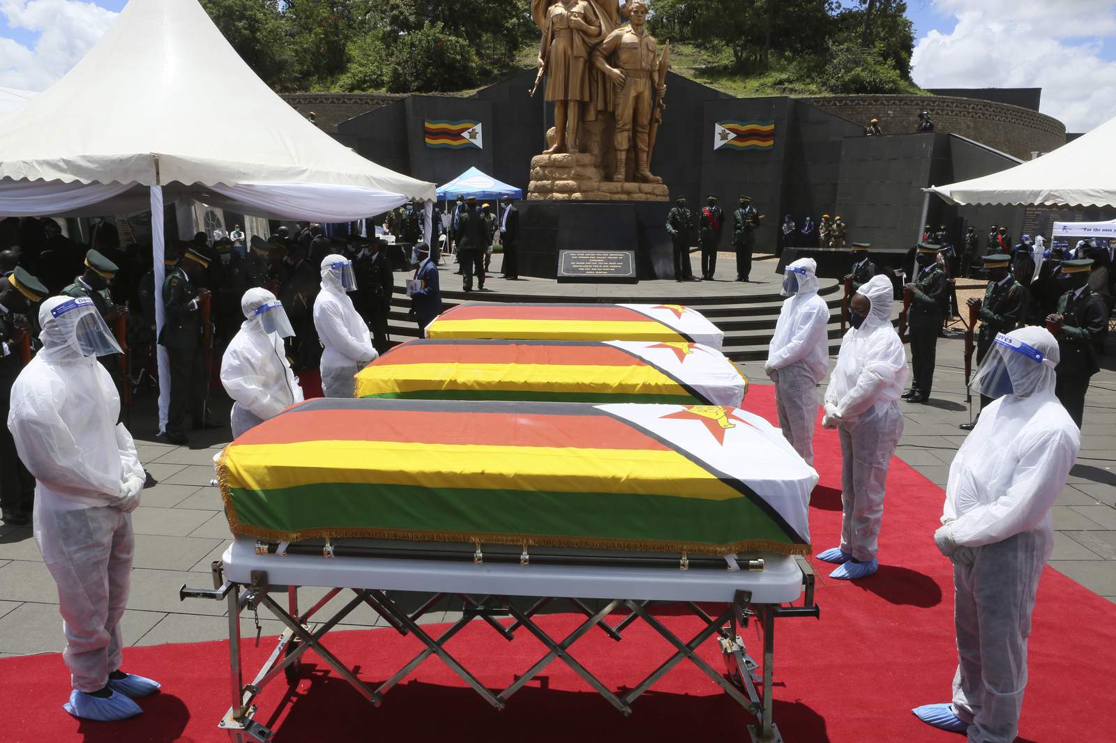 Zimbabwe holds burial for 3 top leaders who died of COVID-19