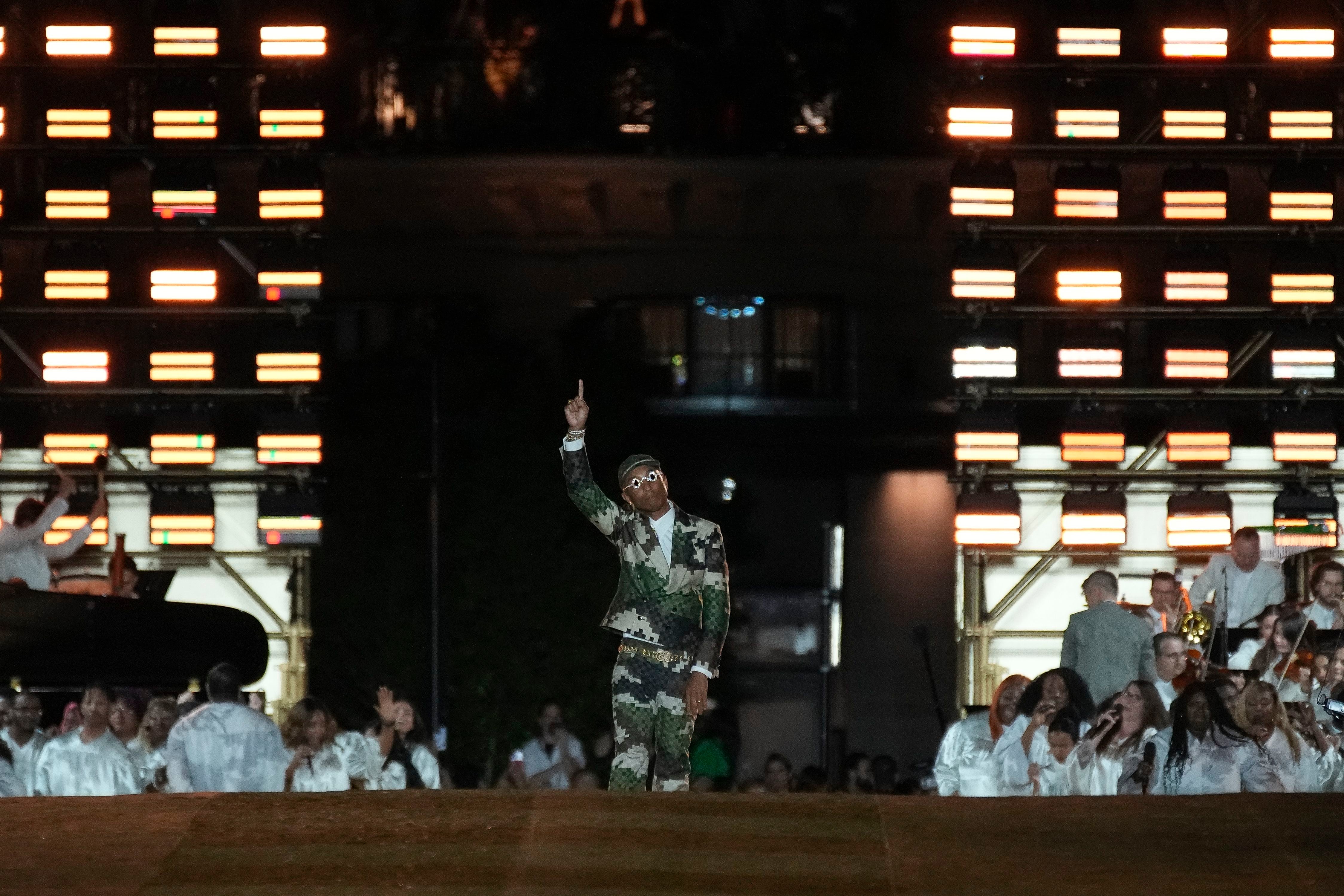 Pharrell Williams brings star power to Louis Vuitton debut