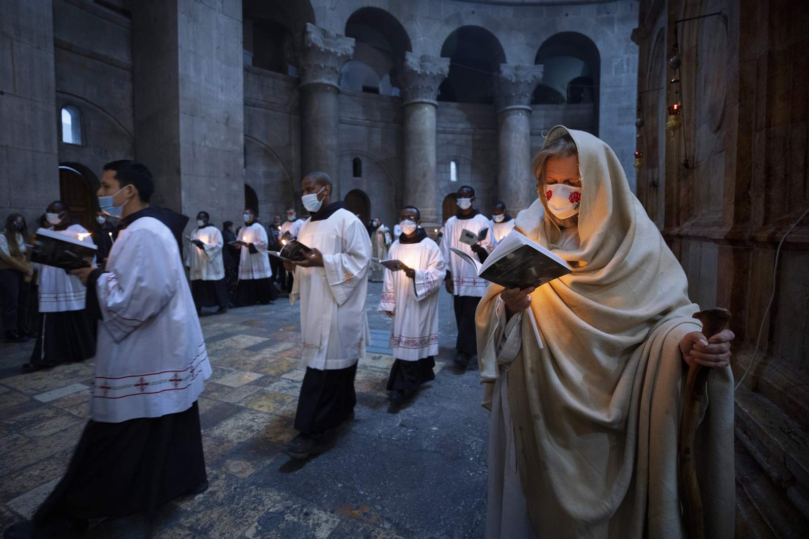 Hymns through masks: Christians mark another pandemic Easter