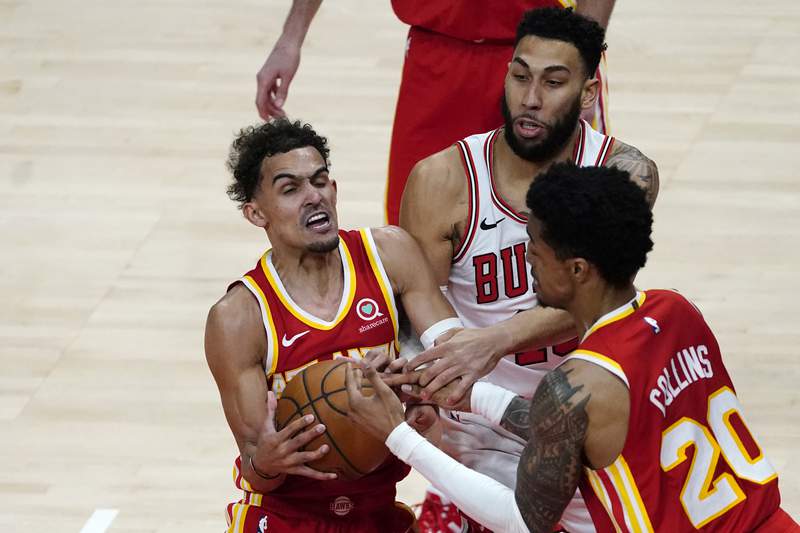 The Latest: NBA's Hawks to increase attendance in playoffs