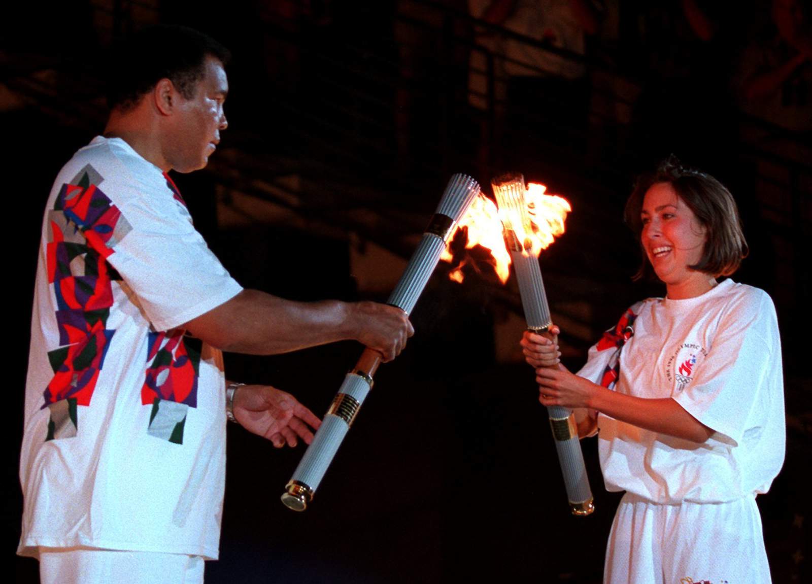 A flame, a look, one of the Olympics' most powerful moments