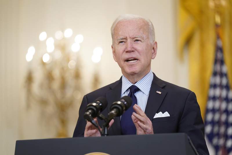 Weak jobs report could spur, slow Biden's huge money package