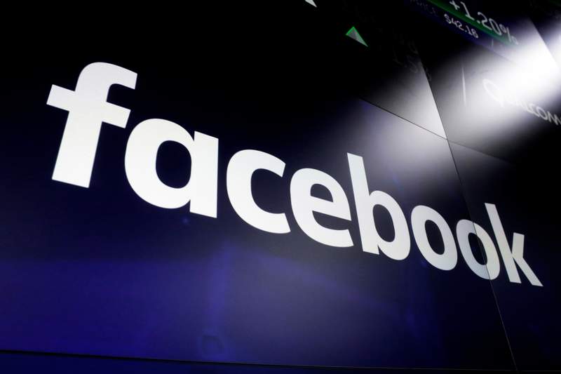 FILE - In this March 29, 2018, record  photograph  is the Facebook logo. (AP Photo/Richard Drew, File)