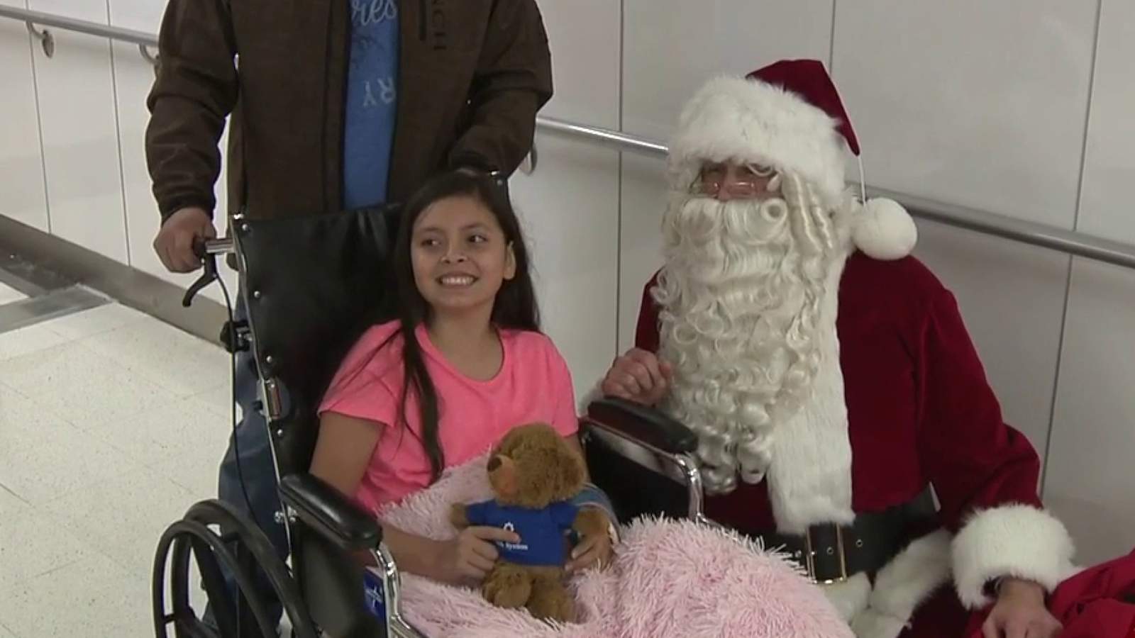 Santa Claus visits University Hospital pediatric patients