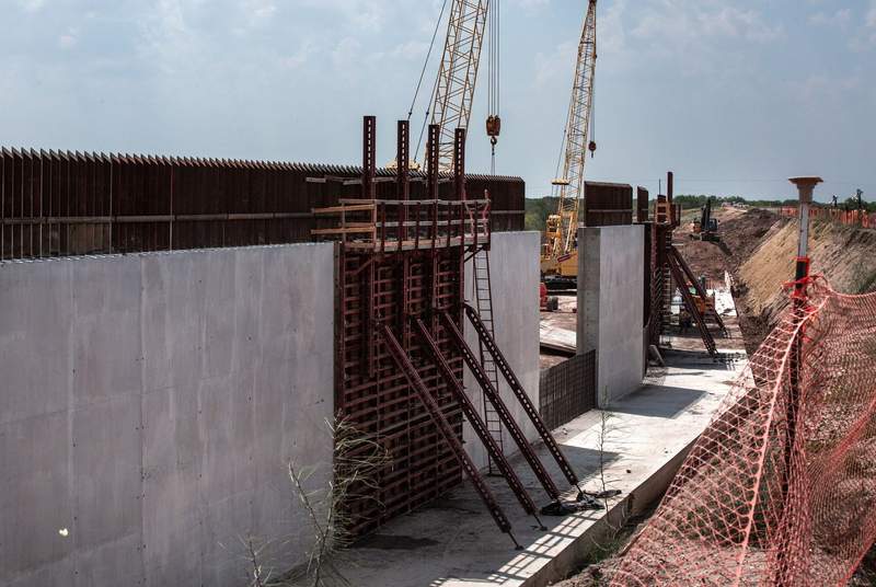 The federal government calls it a levee. South Texas immigration advocates and environmentalists see a border wall.