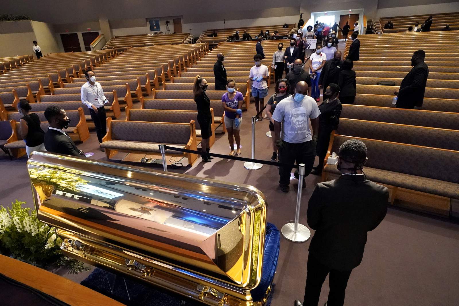 Live coverage: George Floyd set to be buried next to mother after thousands mourned his death in Houston