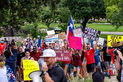 Analysis: A rising commotion in Texas scattershot response to the pandemic