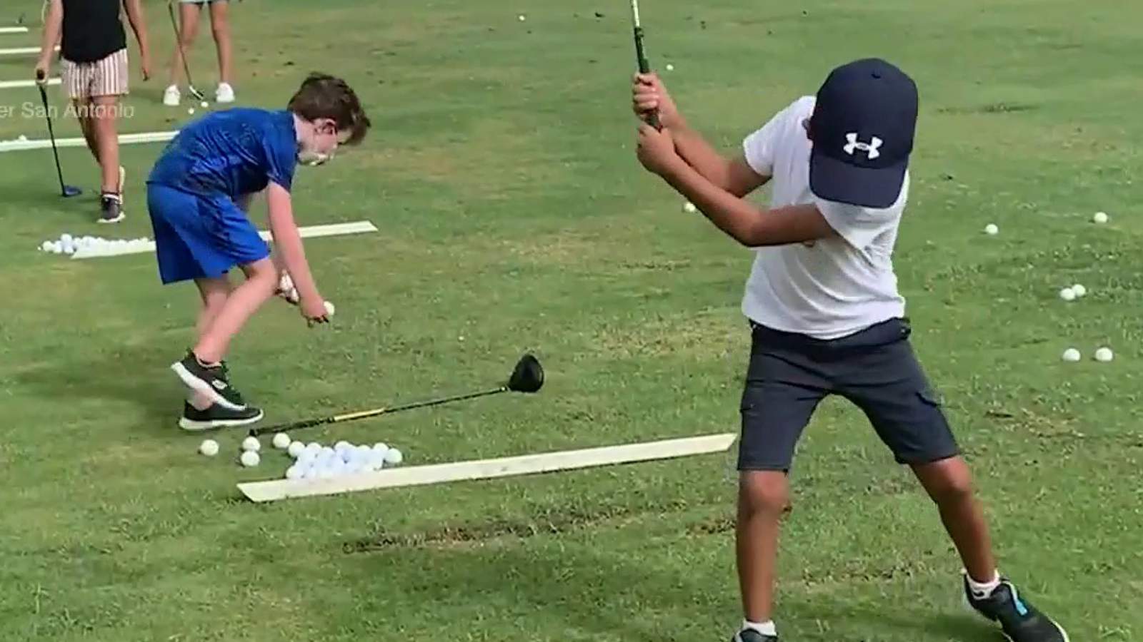Youth development organization tries to introduce kids to game of golf