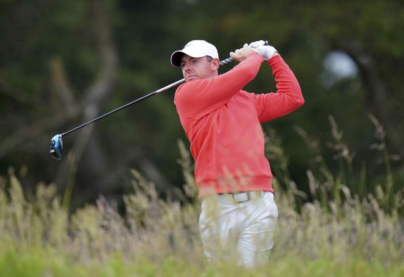 Spectator takes swing of McIlroy's club at Scottish Open