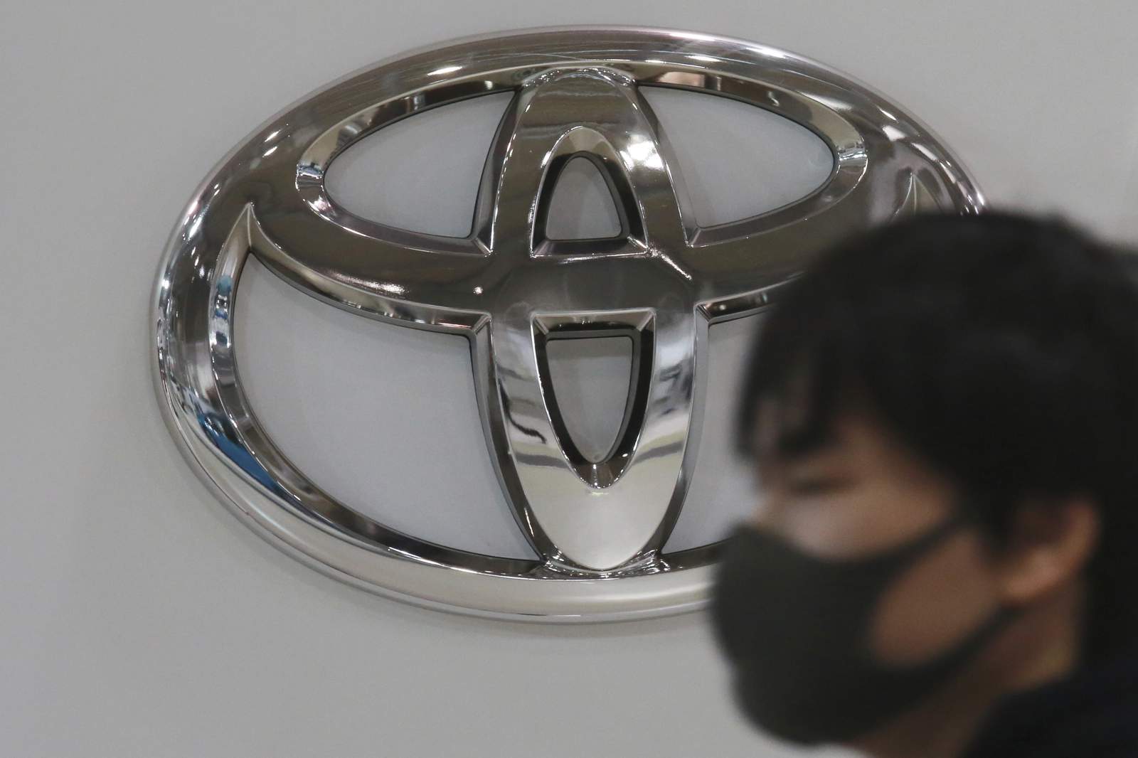 Japan's Toyota sees profit slip, holding up despite pandemic