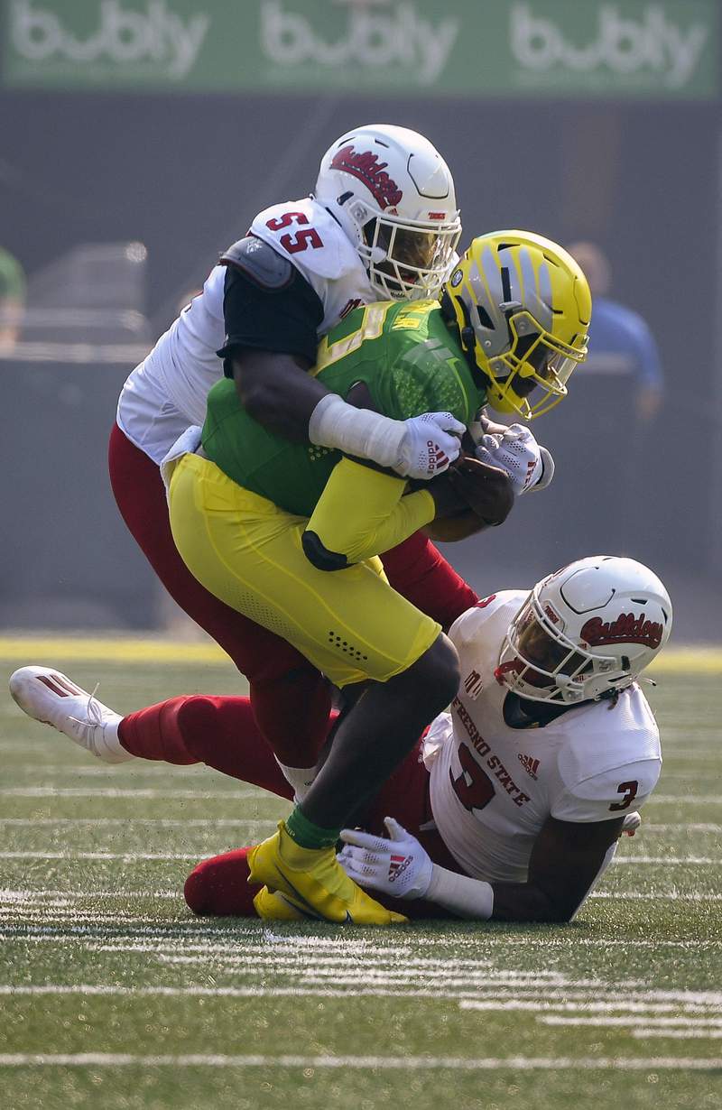 Brown's keeper gives No. 11 Oregon 31-24 win over Fresno St.
