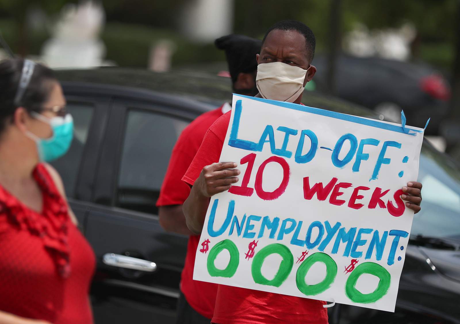 America’s unemployment rate falls to 13.3% as economy posts surprise job gains