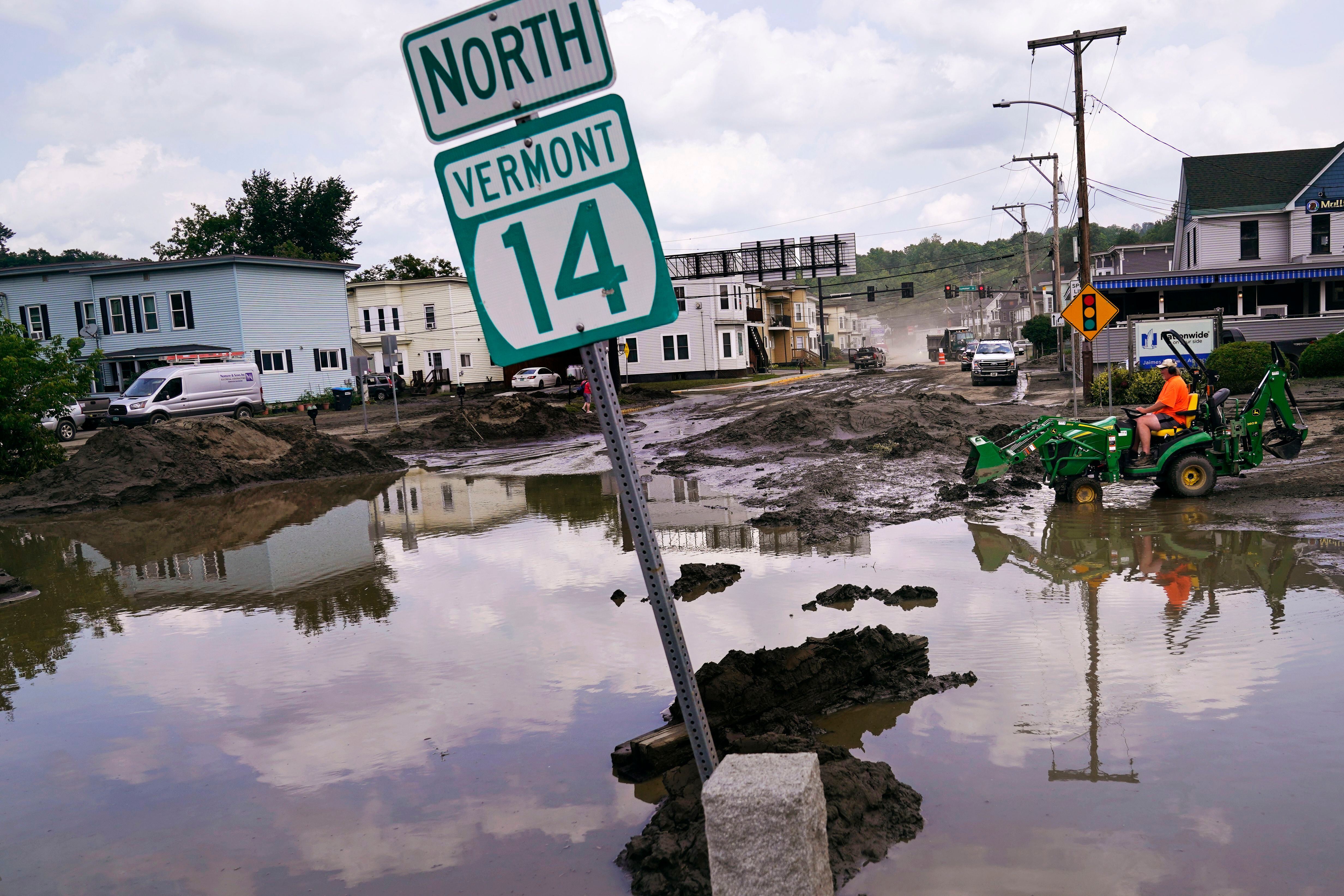 Snow shovels in hand, volunteers help Vermont communities clear the mud  from epic floods