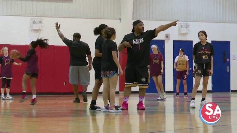 Beloved basketball coach helps players on and off the court