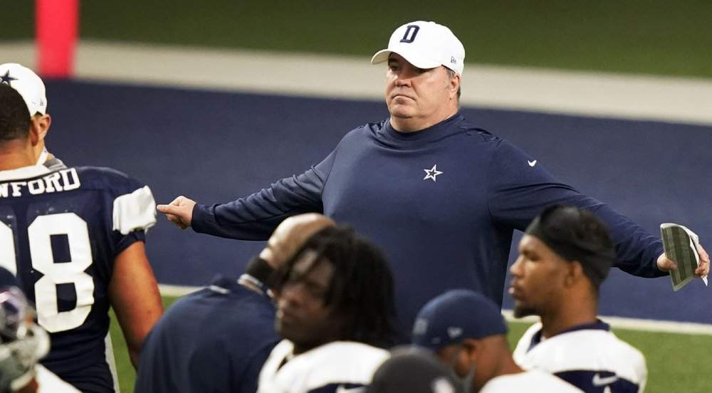 McCarthy embraces title talk in disrupted debut with Cowboys