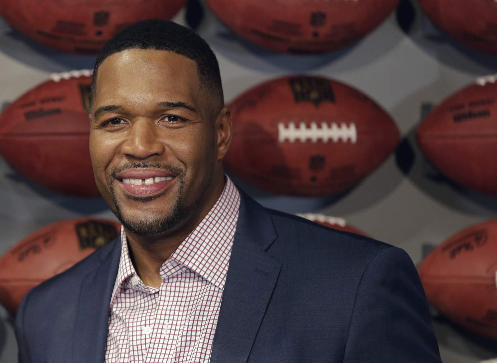 AP sources: Michael Strahan tests positive for COVID-19