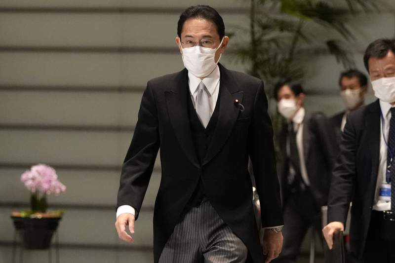 Japan new PM to seek fresh mandate to handle virus, economy
