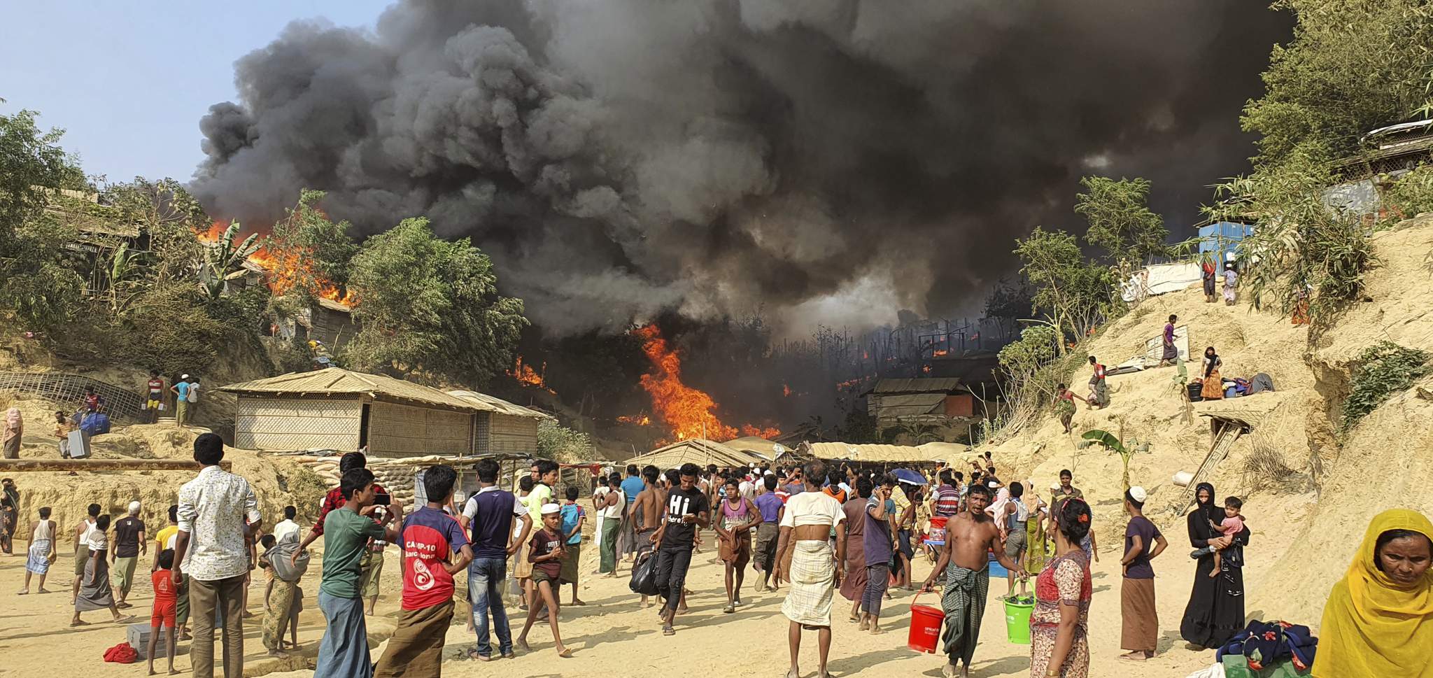 Fire guts hundreds of shelters in Rohingya refugee camp