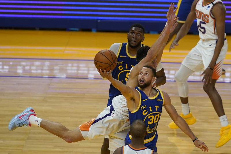 Warriors rally for second straight night, beat Suns 122-116