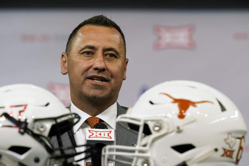 Texas still in Big 12 starting new era with new coach and QB